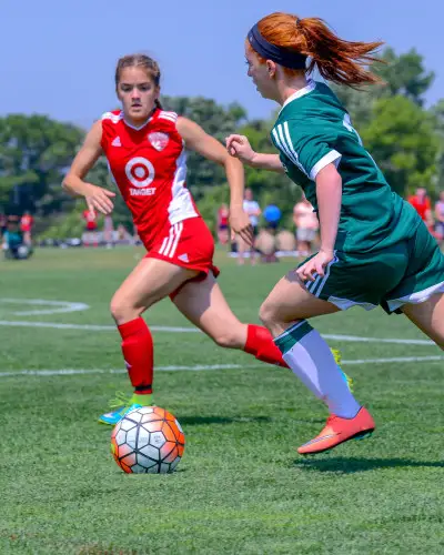 Two Girls Playing Soccer